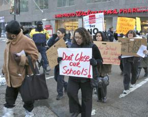 Teachers, parents and community activists march against Chicago public school closures