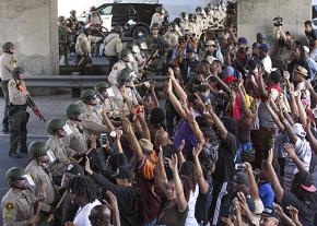 Protesters confront riot police after the murder of Alfred Olango in El Cajon